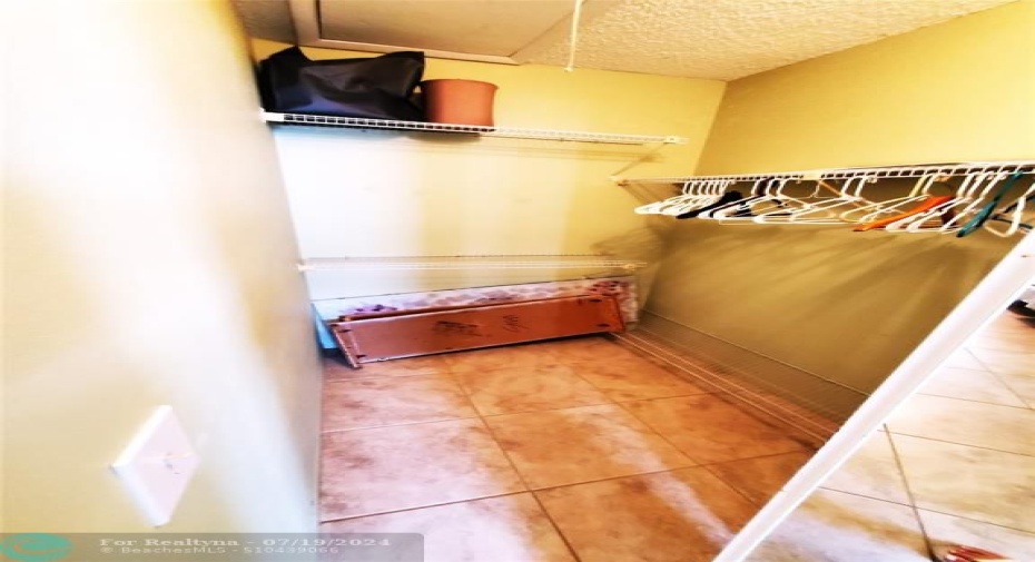 Walk in closet in master bedroom