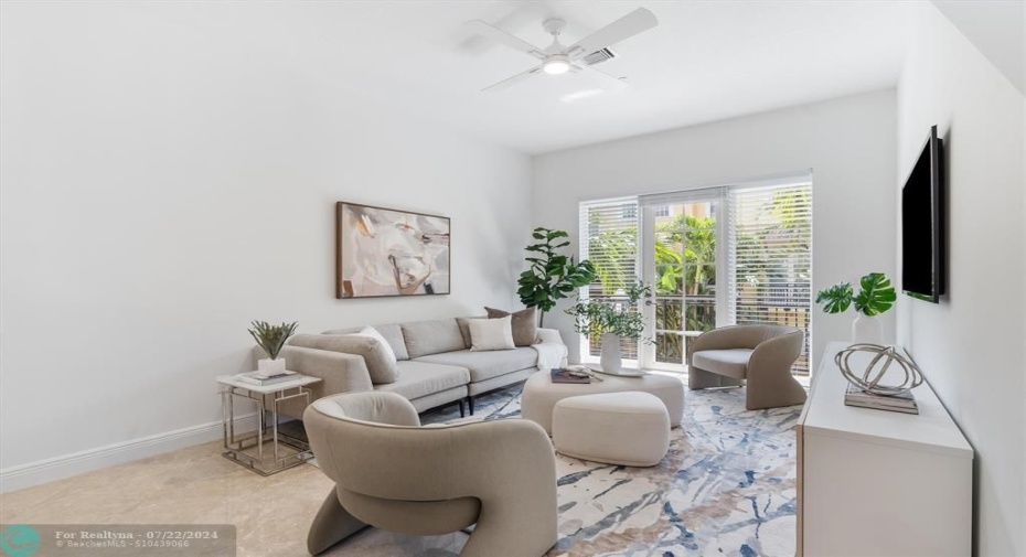 2nd Floor Family Room w/ view of pool area