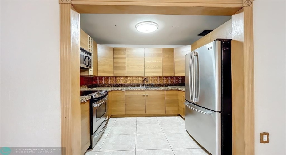 Remodeled kitchen, granite counters, stainless appliances.