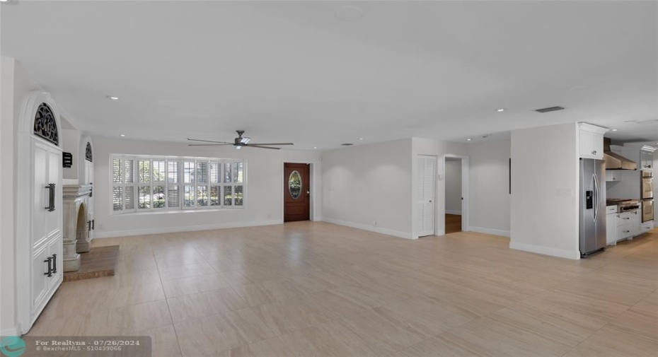 Open and spacious floor plan with recessed lighting and freshly painted with great natural light