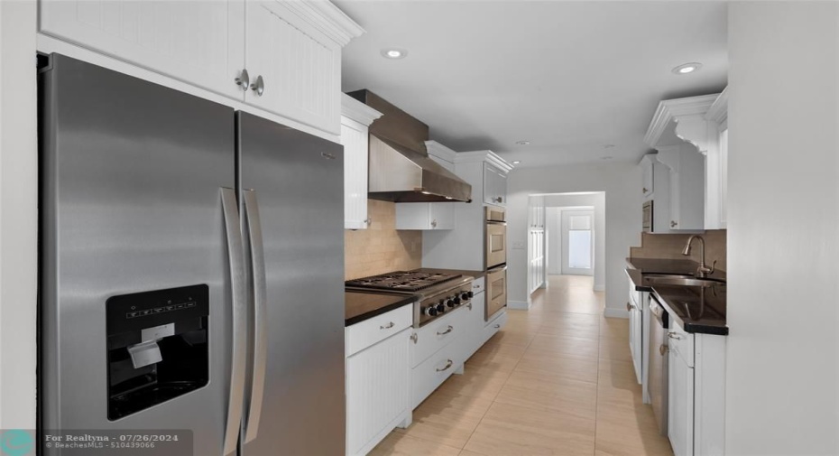 Stainless appliances and tons of storage offered in kitchen