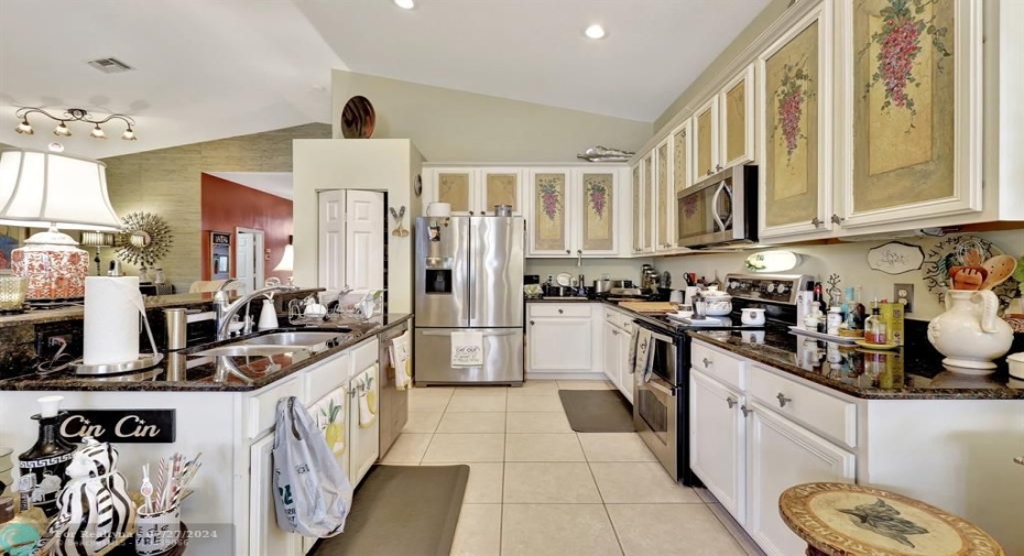 Kitchen with pantry closet.