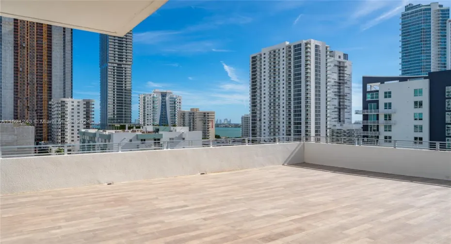 Enjoy 980 SF open air terrace from your 9th Floor Residence.