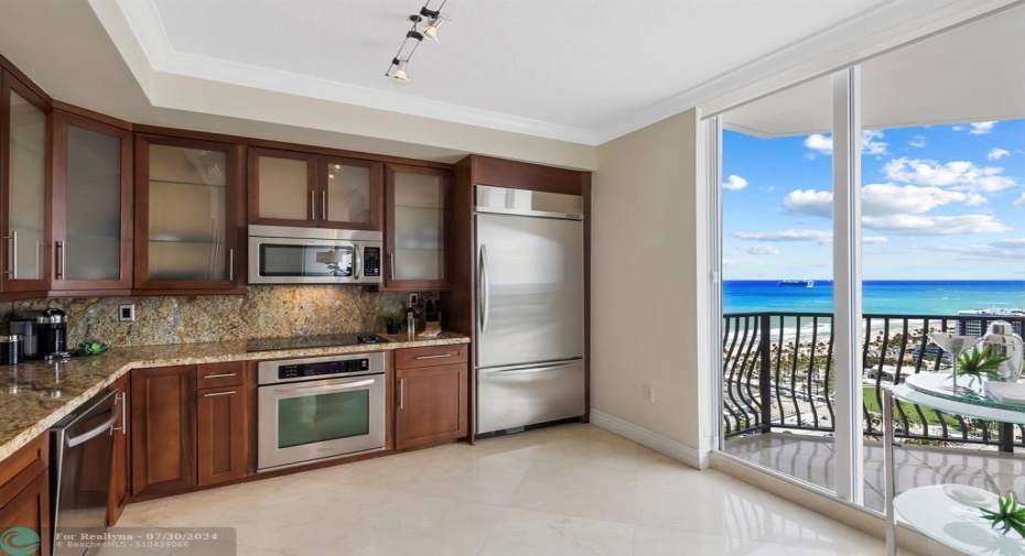 Large Kitchen with Panoramic View and Access to Terrace.