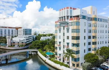 Helen Mar sits on Intracoastal Waterway across footbridge to Atlantic Ocean and Collins Ave