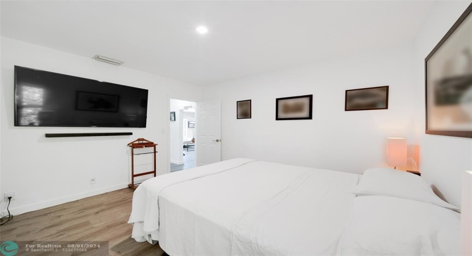 Enjoy Your Own Private Primary Bedroom Retreat with Luxury Vinyl Wood-Like Floors & an UPDATED 2023 Large En-Suite Bathroom with Ceramic Tile Floors & Lots of Closet Space.