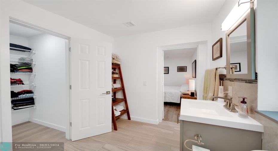 So much storage in this en-suite primary bathroom with Ceramic Tile Floors.