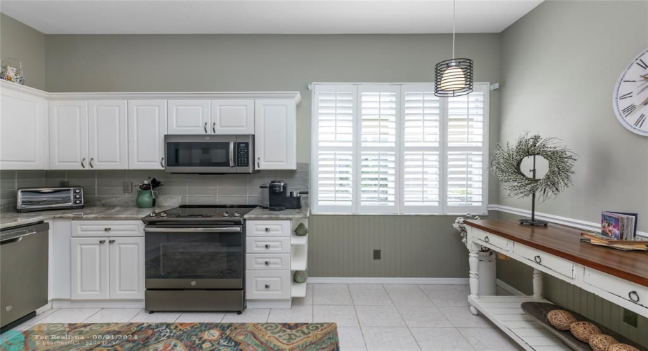 Plantation Shutters Plenty of room to create an Eat in Kitchen