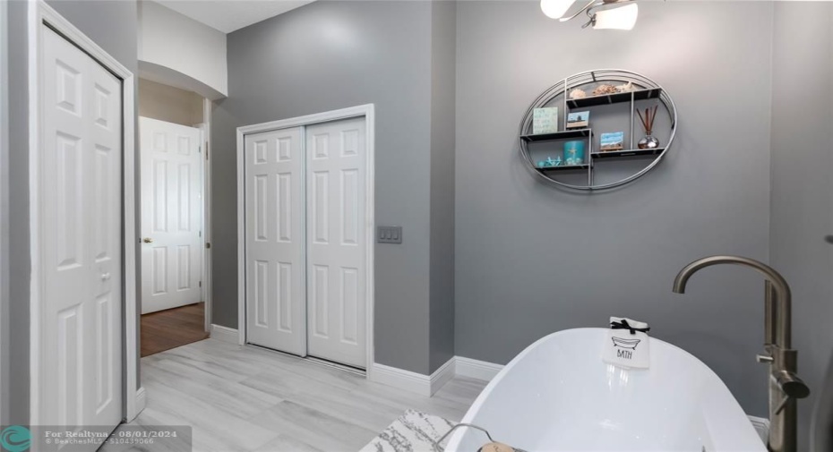 Linen Closet on Left, Sliding Door Closet on Right