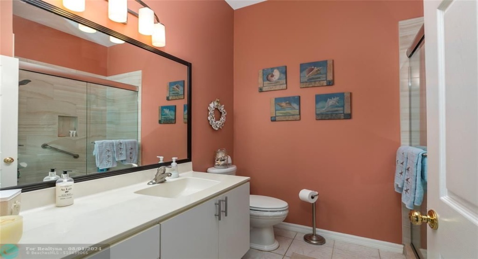 Guest Bathroom Vanity has updated Faucet & Hardware