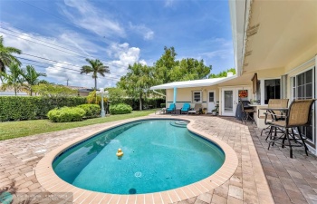 Freeform pool and fenced yard on this great 3 Bed/ 2 Bath home in Lighthouse Point