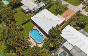 Oversized (33x18) above ground pool which is also partially sunken and maintained just like a concrete pool with a pool pump filtration system.