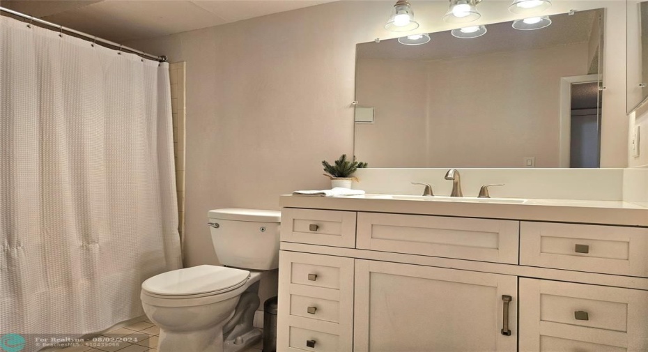 NEWER VANITY WITH PLENTY OF STORAGE