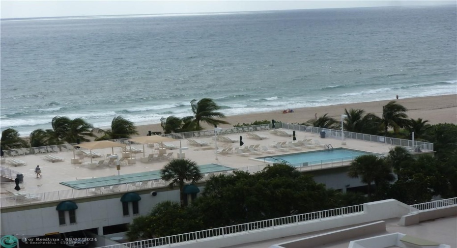 POOL DECK AND OCEAN VIEW FROM BALCONY