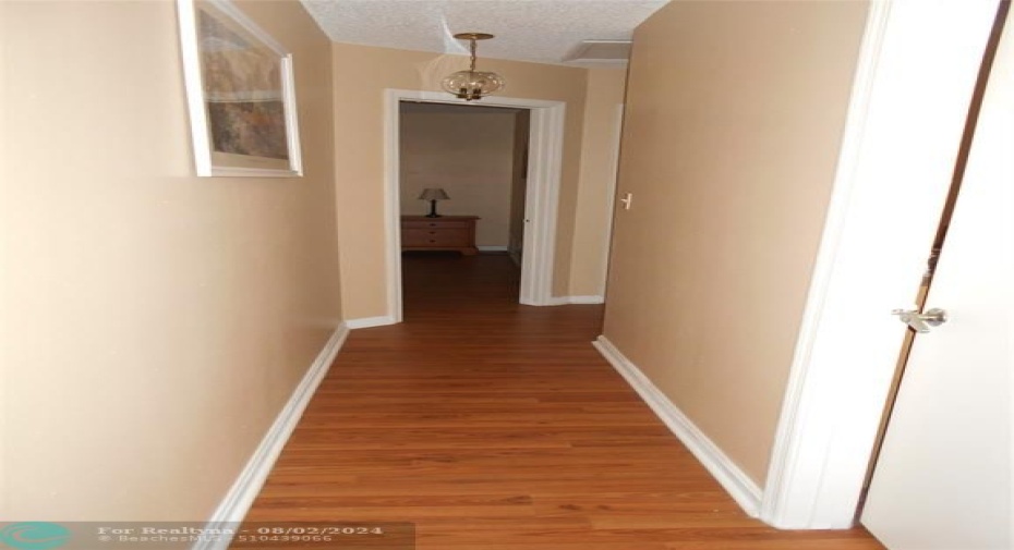Upstairs hallway leads to 3 bedrooms, each with their own walk-in closet