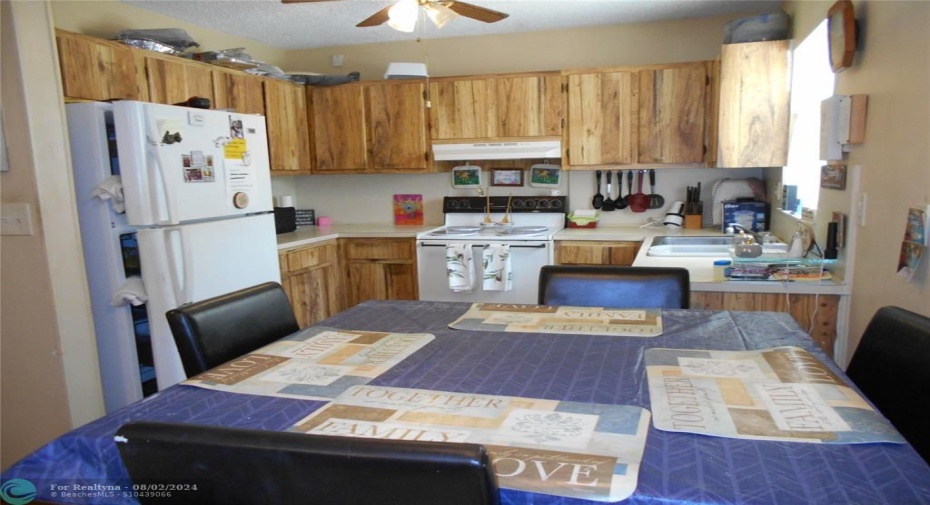 Lots of cabinets in the kitchen and room for a table as well!