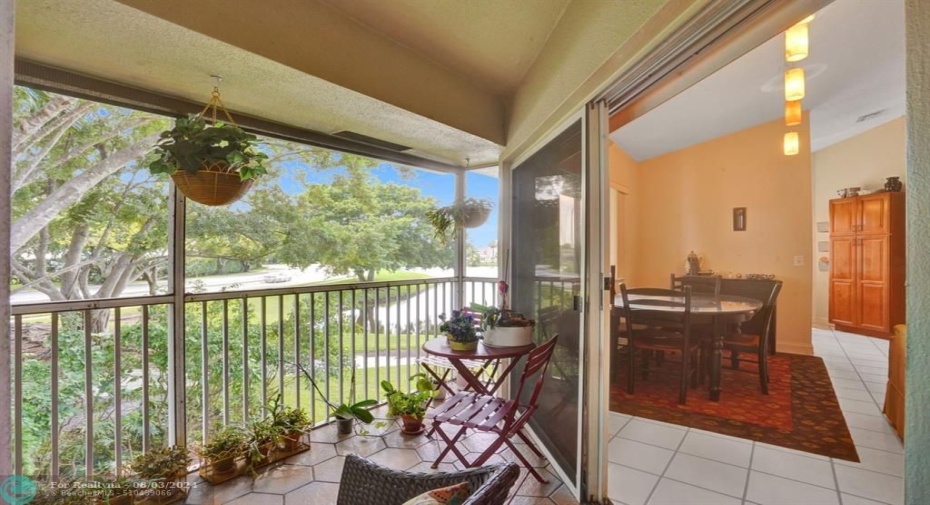 screened in patio with view of lake