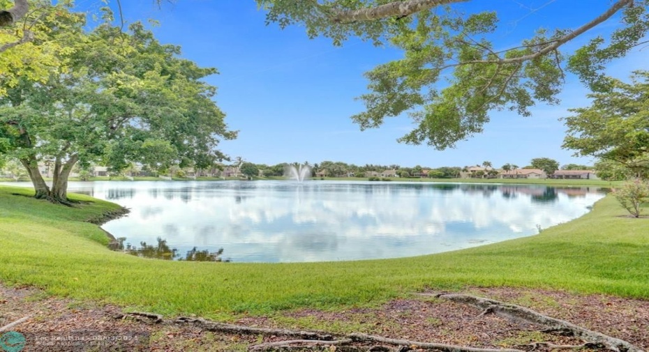 view of lake from second flloor kitchen, balcony, dining area.