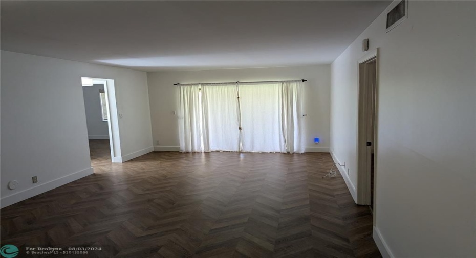 Spacious Living Room opening to a covered porch