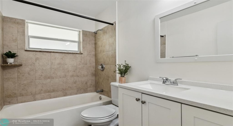 Remodeled tiled bath-shower, newer vanity