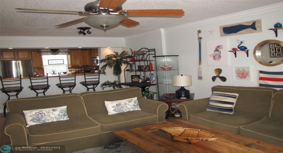 VIEW OF LIVING ROOM & DINING AREA