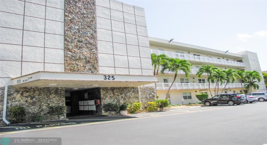 FRONT OF BUILDING, WITH SECURITY CAMERAS