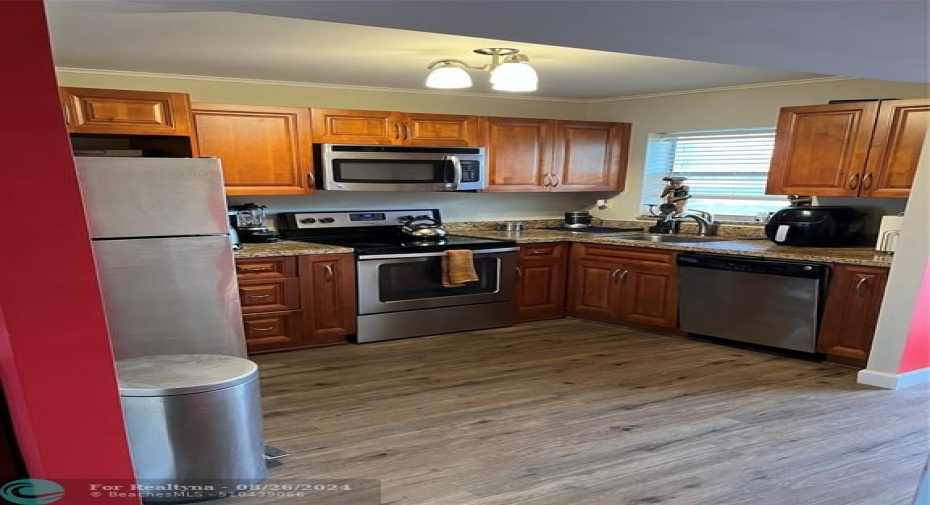 Open Kitchen with SS appliances.