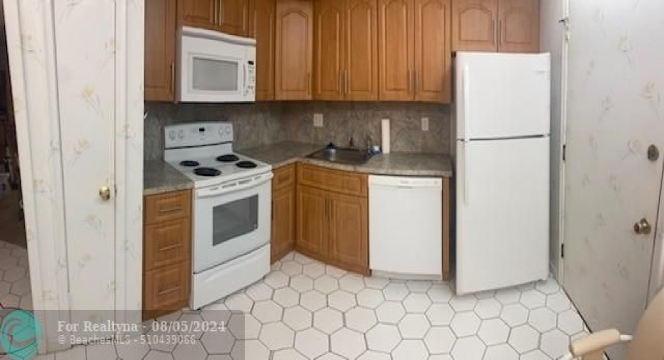 Updated cabinets, counter-top and appliances