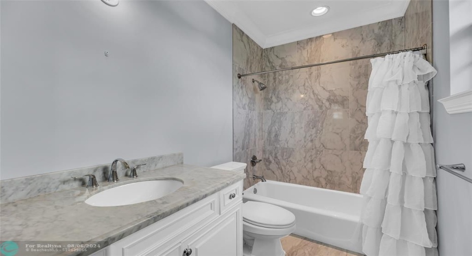 Bathroom 3 with tub/shower combo and marble vanity