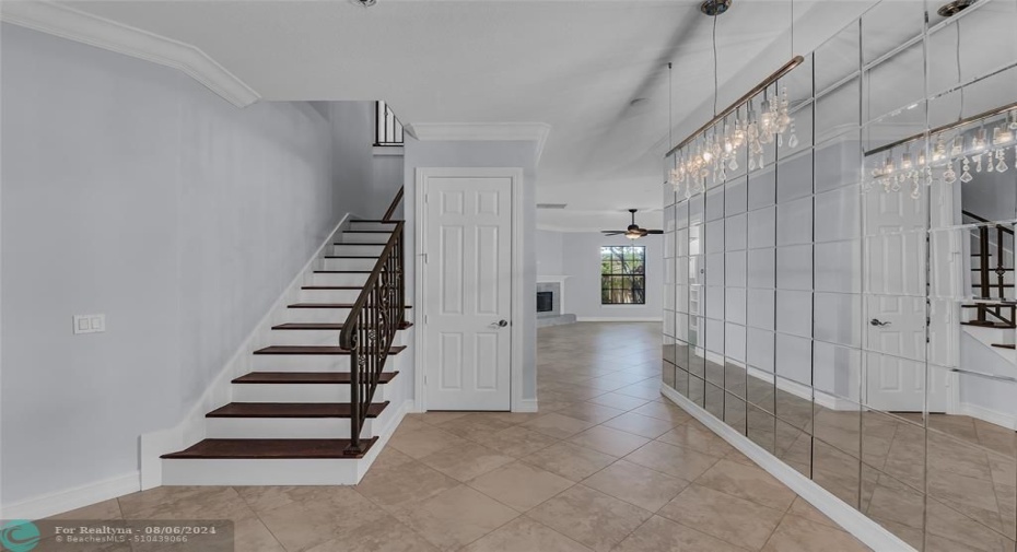 Spacious front foyer with extra storage closet