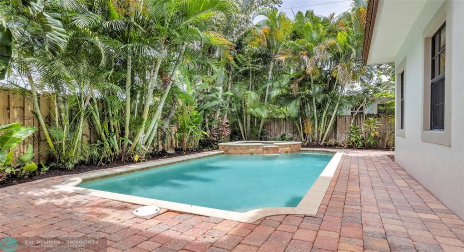 Private and tropical pool area is fully fenced and the perfect place to relax