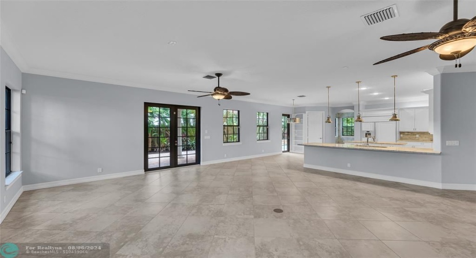 Tons of space and open floor plan offered in family room and kitchen