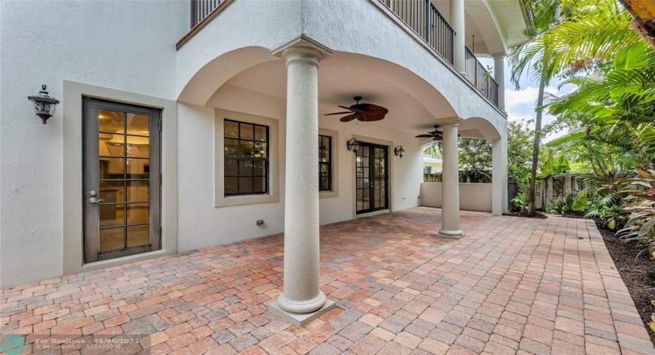 Large covered patio is great for entertaining and avoiding the harsh sun