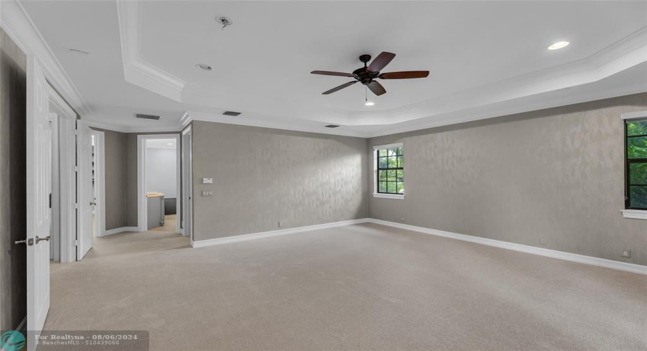 Master Bedroom is large and spacious and offers crown molding, carpet flooring and high-hat lighting