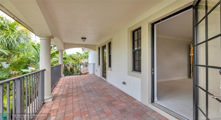 Large pavered balcony off of master Bedroom suite