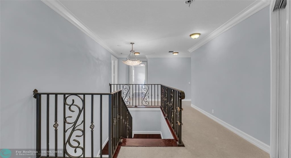 Second floor hallway between the 4 bedrooms upstairs