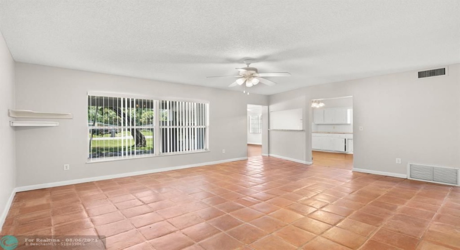 Living Room Dining Room with View to Bonus Room & Kitchen