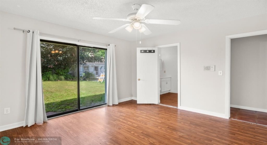 Bedroom #1 with view of Half Bath and Closet