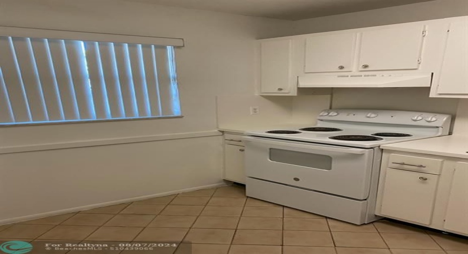 VIEW 2 OF KITCHEN-ROOM TO ADD SMALL DINING TABLE