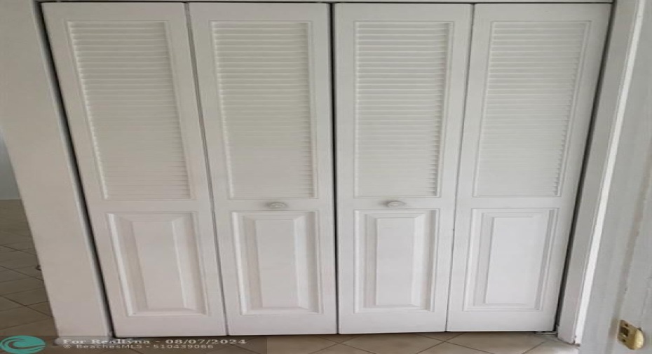 LINEN CLOSET IN HALLWAY GOING INTO BEDROOMS - PIC 1