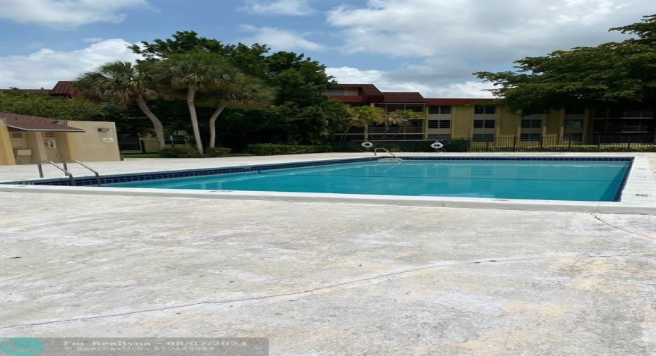 VERY NICE SIZE COMMUNITY POOL - WITH BLDG TO CHANGE AND USE RESTROOM