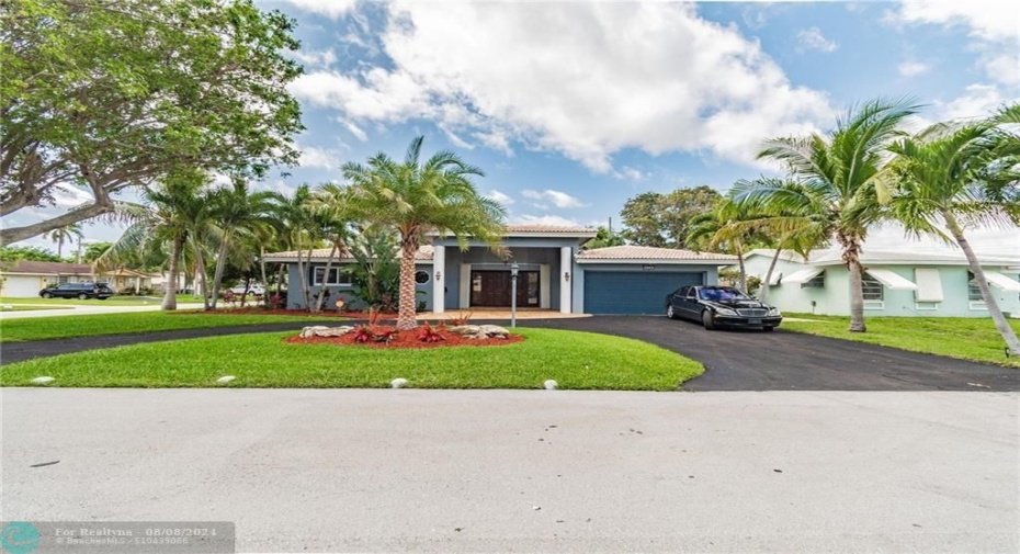 Circular Driveway and 2 car garage