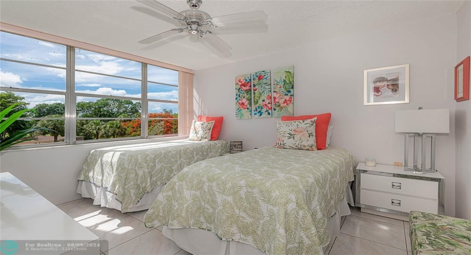 GUEST BEDROOM WITH WALK IN CLOSET GORGEOUS VIEWS HURRICANE SHUTTER ON ALL WINDOWS AND BALCONY