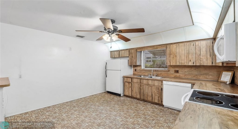 Space for an eat in kitchen table and counter barstools