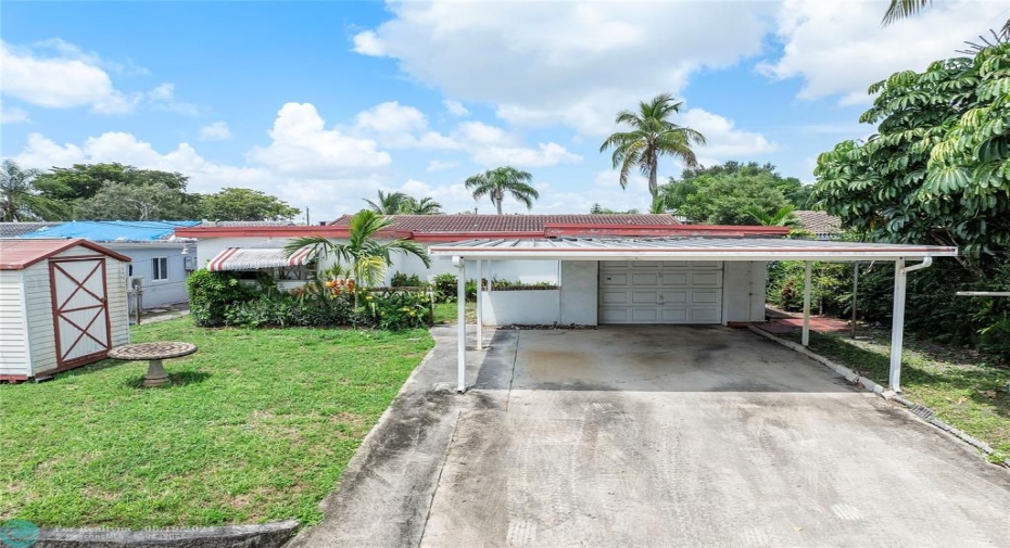 4 car driveway - one car garage. Shed on property and room for a pool