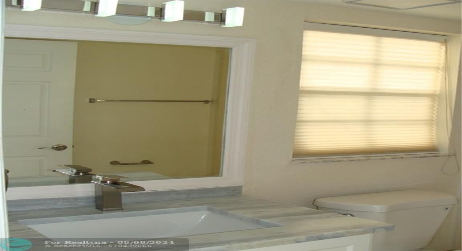 Master Bathroom with Premium Faucets and Granite