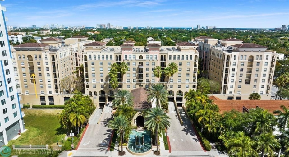 Main entrance to 520 SE 5 Avenue    Las Olas by the River   Yellow arrow on left side of photo points to unit's second balcony