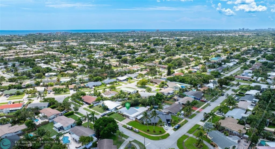 Home & neighborhood with ocean in background