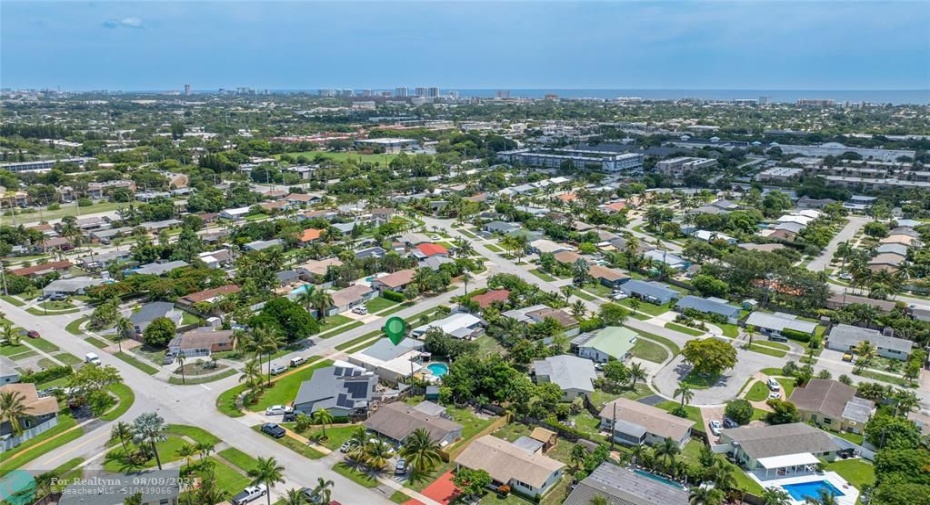 Home & neighborhood with ocean in background