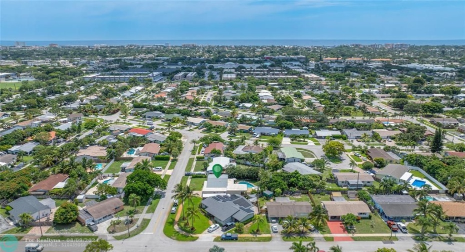 Home & neighborhood with ocean in background